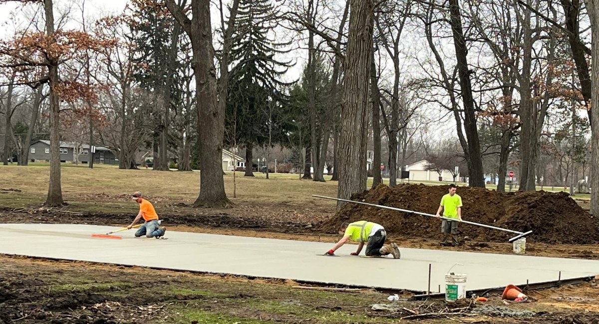 A new concrete pad takes shape in Victory Park