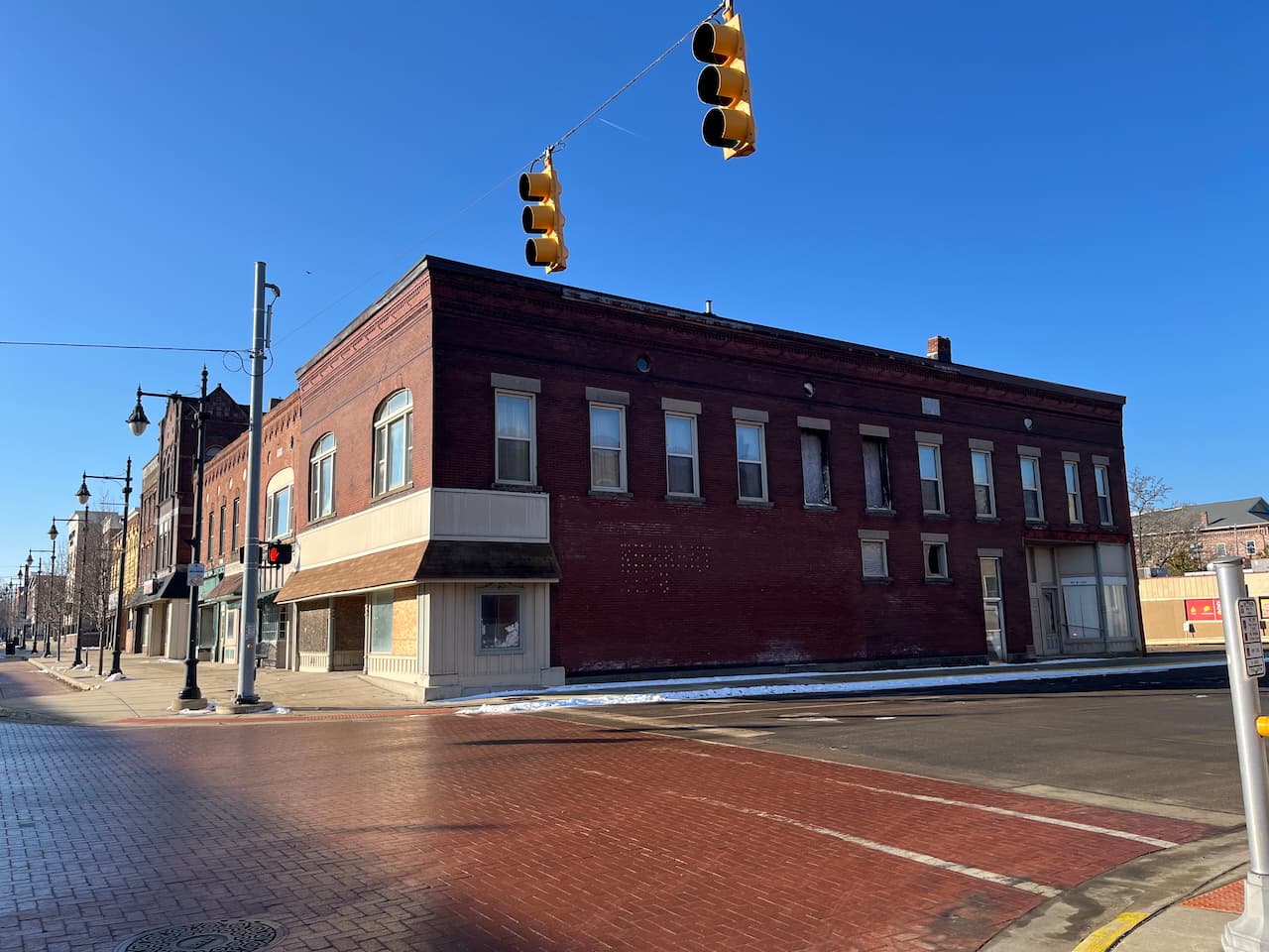100 S. Superior Street, shown with burned-out upper windows