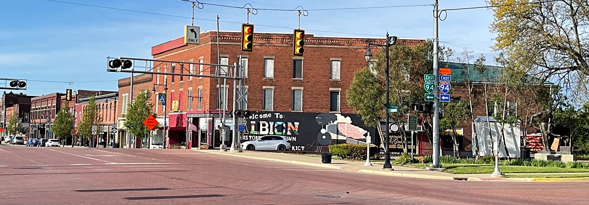The Molder sculpture and the Historic District marker