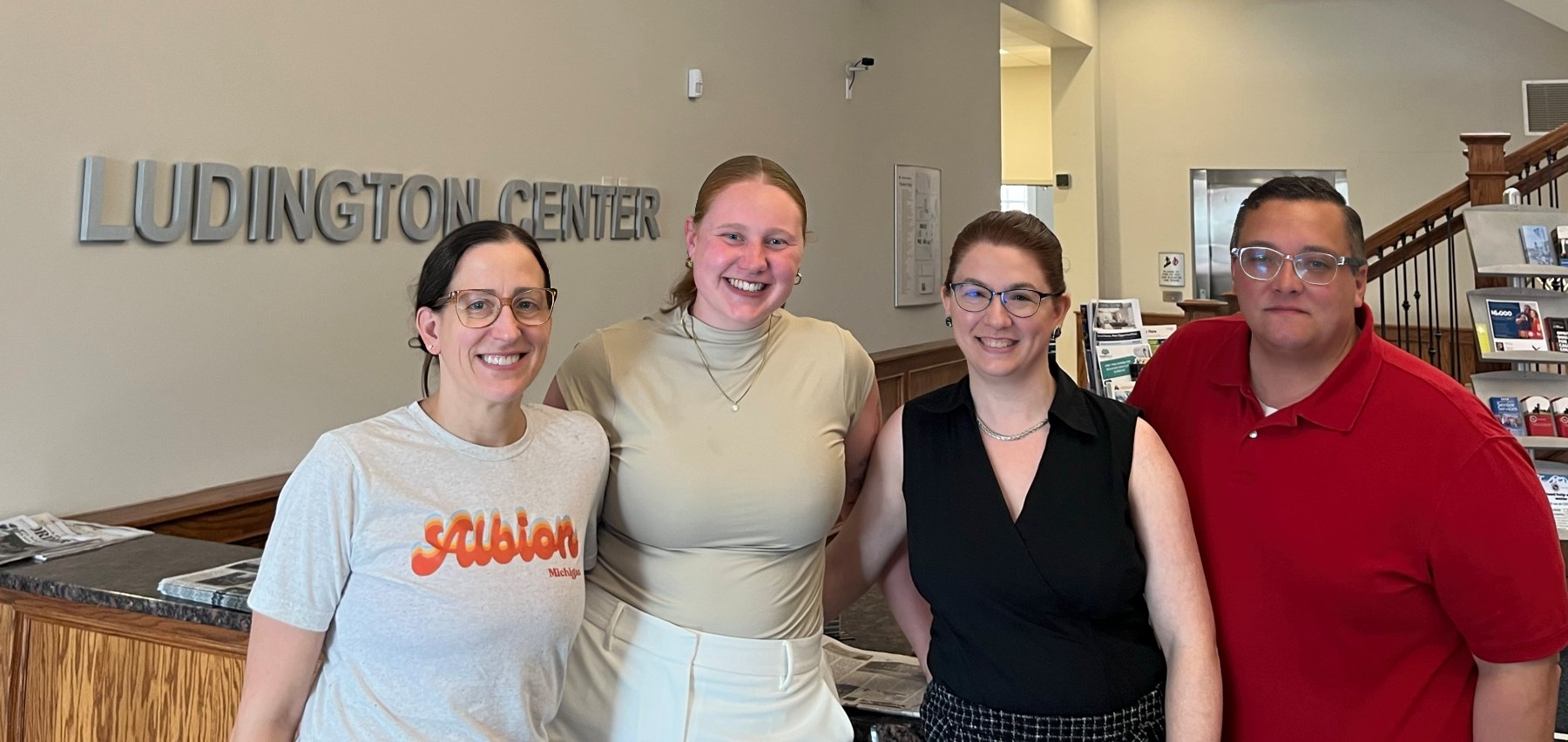 Albion Community Foundation staff members gather in their new home at the Ludington Center in downtown Albion. From left are Cary Soltis, director of education; Cassidy Porter, community brand ambassador; Margaux Dever, community grant writer; and Shane Williamson, president & CEO.