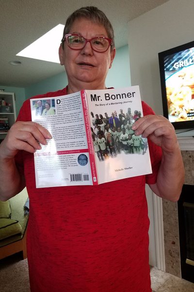 Michelle Mueller with her first book, "Mr. Bonner"